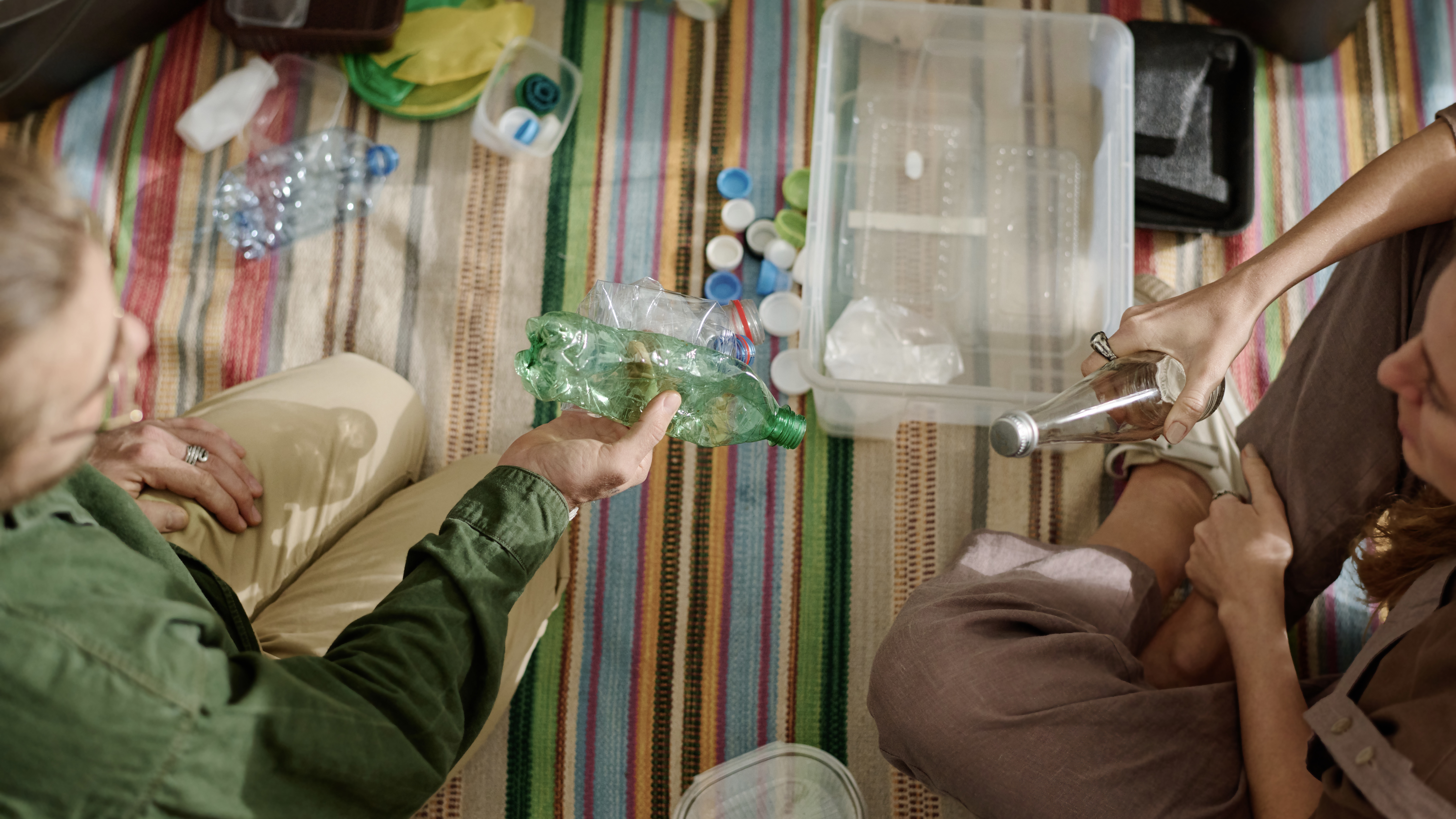 People sorting plastic image