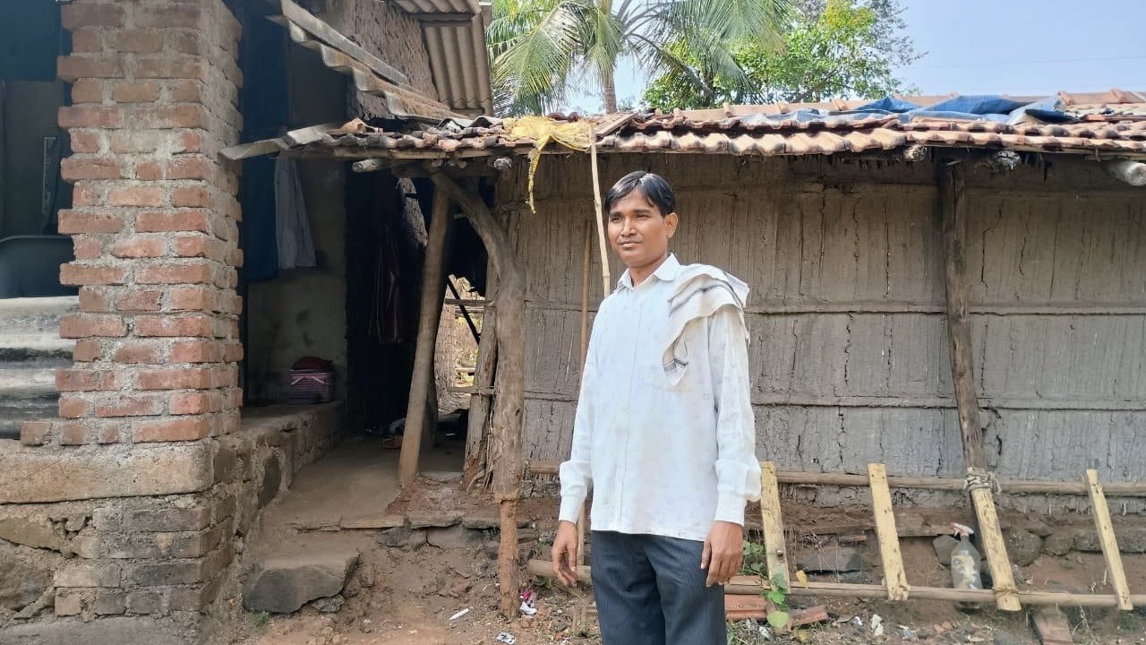 Sachin in front of his house